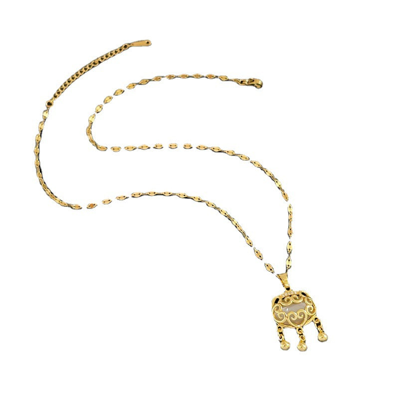 Collar con colgante de cerradura de longevidad de acero de titanio con incrustaciones de jade Hetian simulado y detalle de borla para mujer