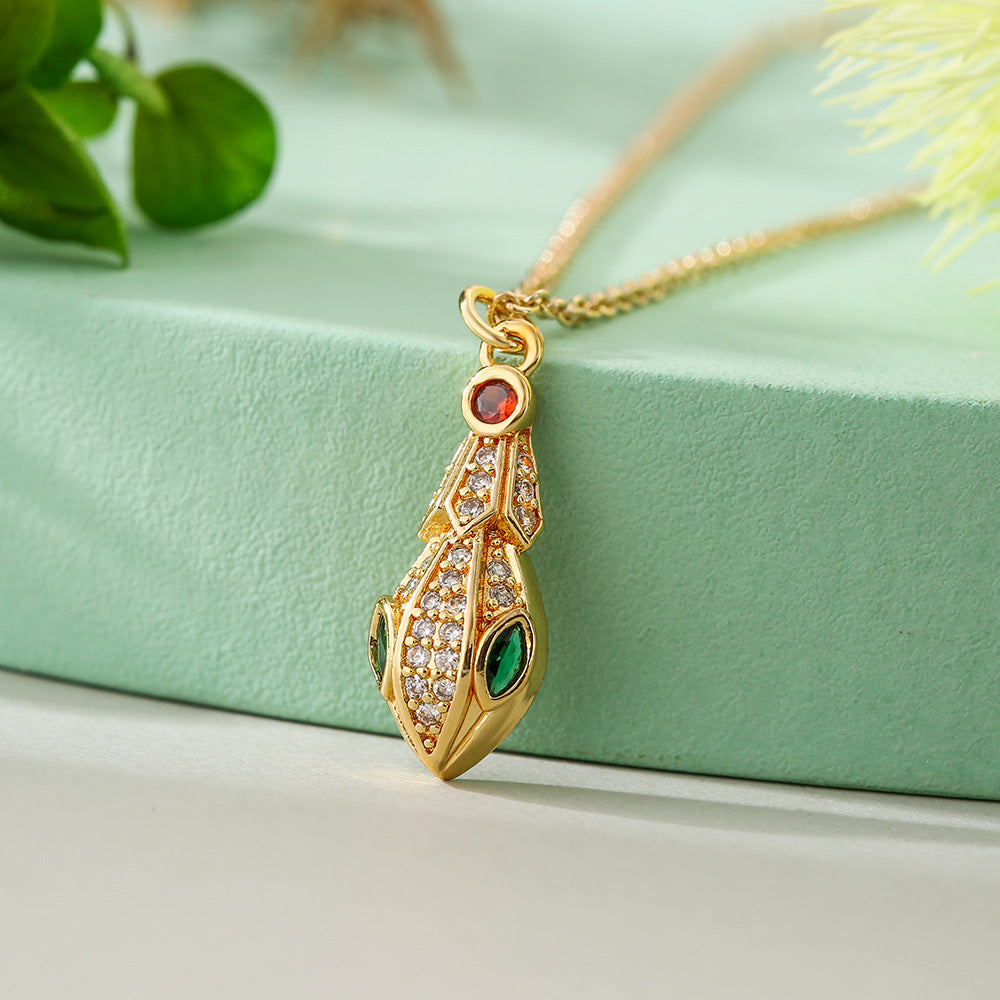 Collana pendente a forma di serpente stile bohémien da donna con base in rame e placcatura in oro vero, intarsio in zircone, design geometrico