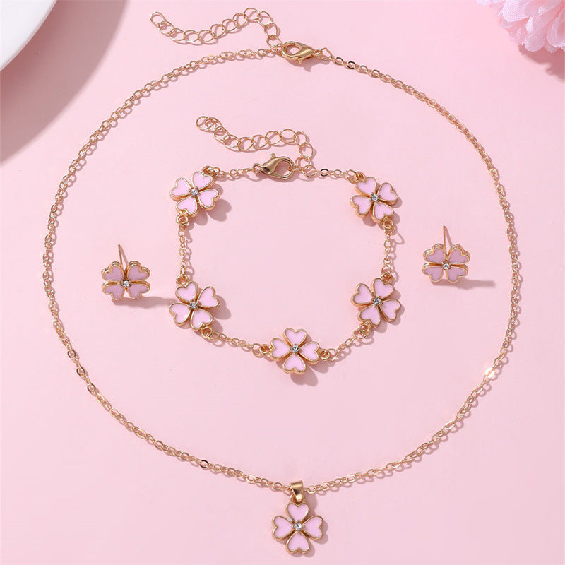 Minimalist Bowknot Resin Necklace Set for Girls with Matching Bracelet and Stud Earrings Featuring Enamel Finish