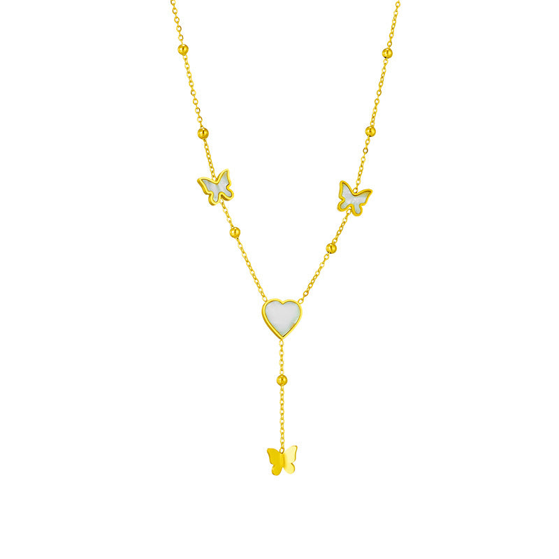Collar con colgante minimalista de corazón y mariposa con borlas de acero titanio con acabado chapado para mujer