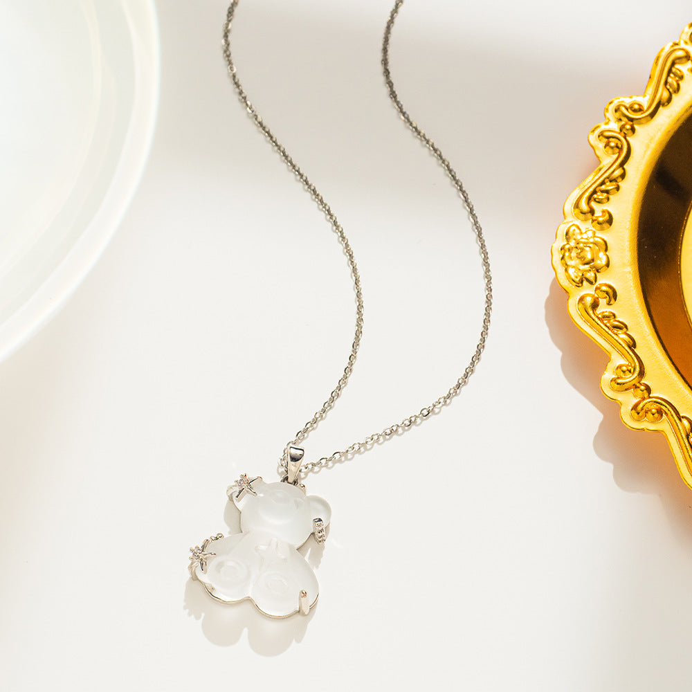 Collana pendente minimalista orsetto e stella da donna in acciaio al titanio placcato oro con catena a maglie ovali