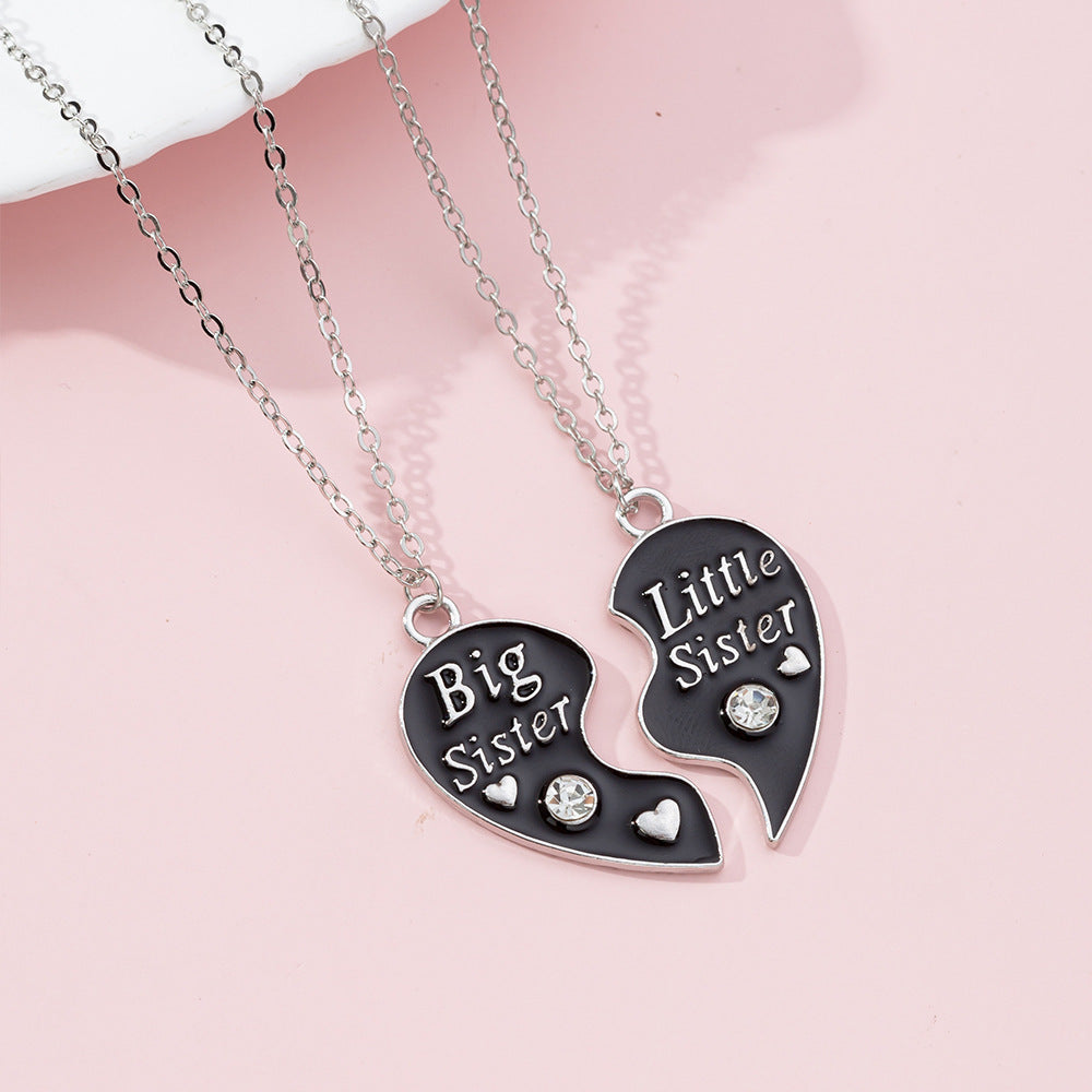 Lindo collar con dije de Stitch de dibujos animados para niños en aleación con acabado de esmalte y dije en forma de corazón en cadena cruzada