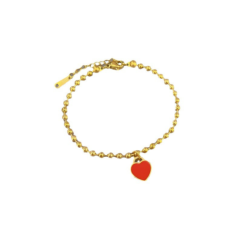 Bracciale da donna vintage bohémien a forma di cuore in acciaio al titanio placcato oro con texture ondulata
