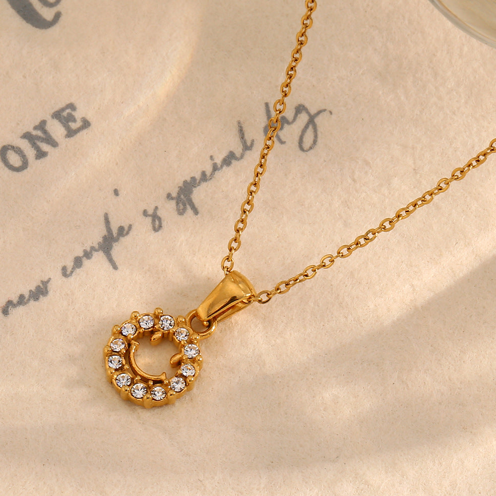 Minimalist Geometric Hollow Smiley Face Pendant Necklace for Women in Stainless Steel with 18K Gold Plating and Zircon Inlay