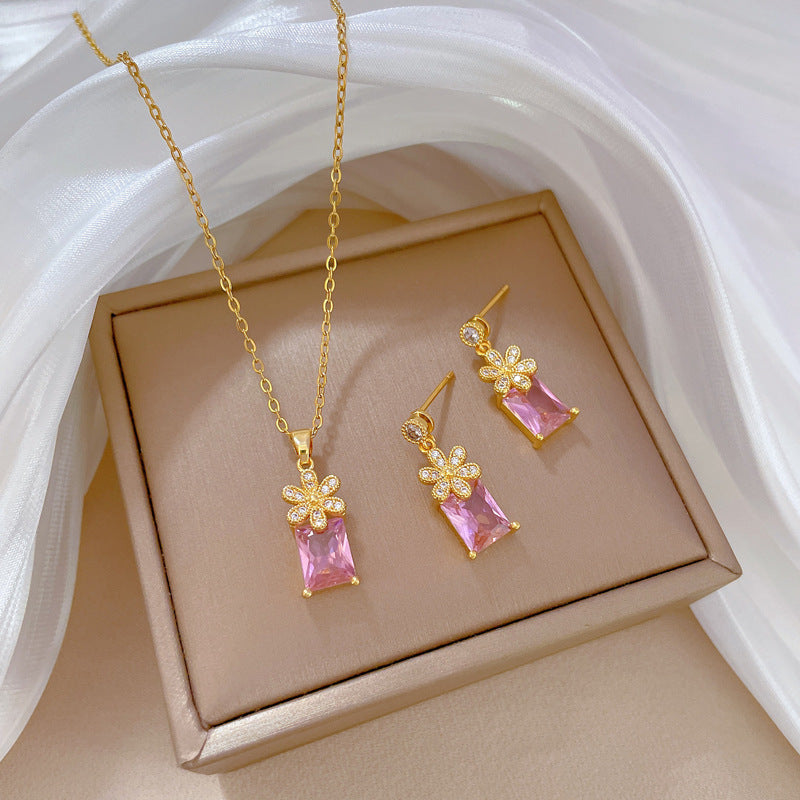 Parure di Orecchini e Collana in Rame Placcato con Zirconi Geometrici di Lusso