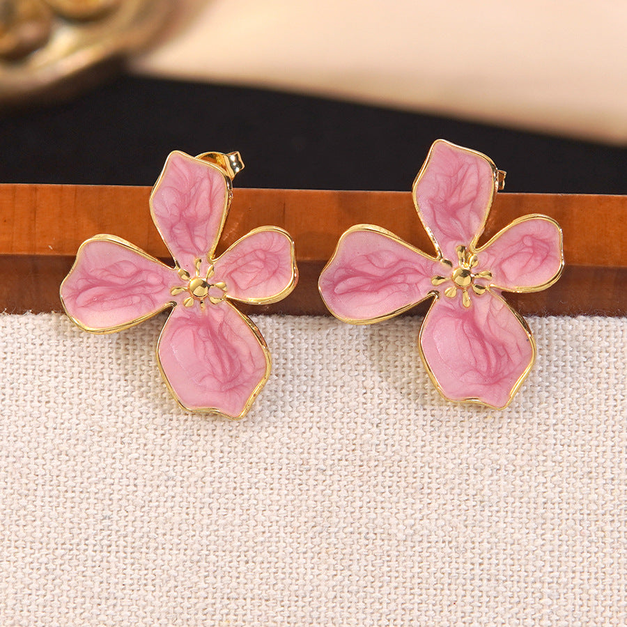 Elegante set collana e orecchini da donna in acciaio inossidabile con motivo floreale a goccia d'olio per affari
