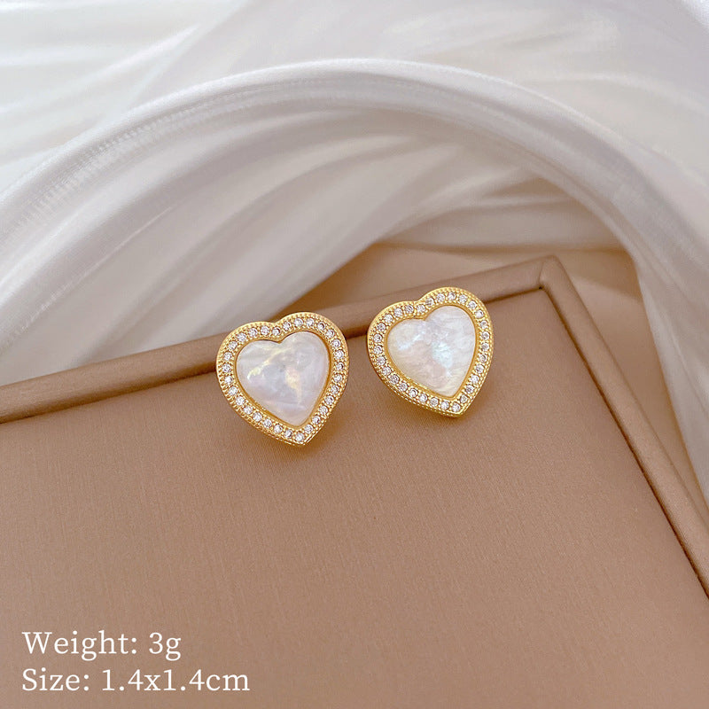 Set di collana e orecchini a cuore geometrico in acciaio al titanio di lusso