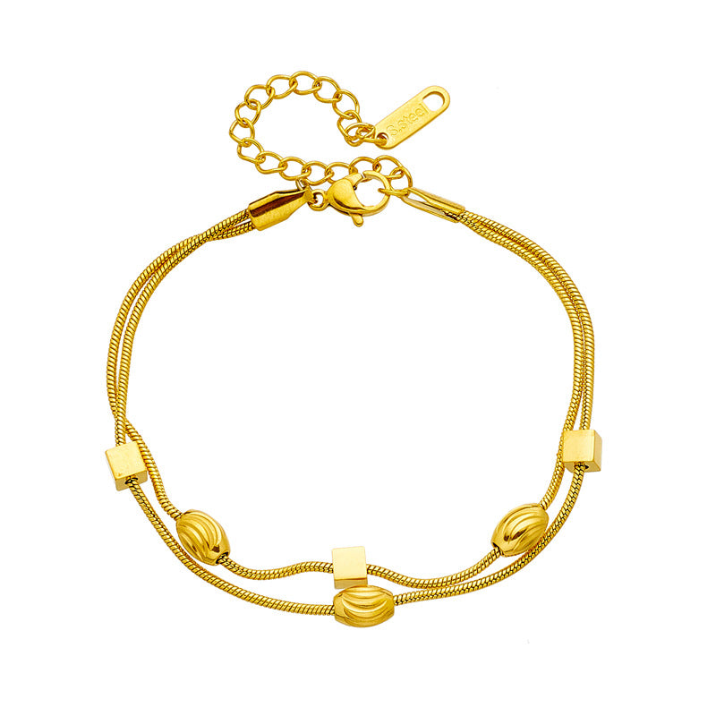 Pulsera minimalista de acero de titanio chapado con doble capa geométrica irregular para mujer