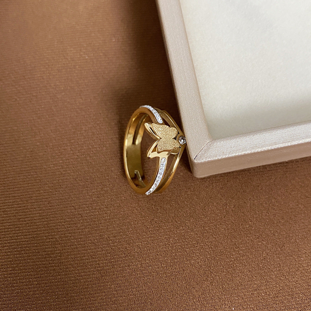 Anello minimalista a forma di farfalla in acciaio al titanio con intarsio di strass per uomo e donna