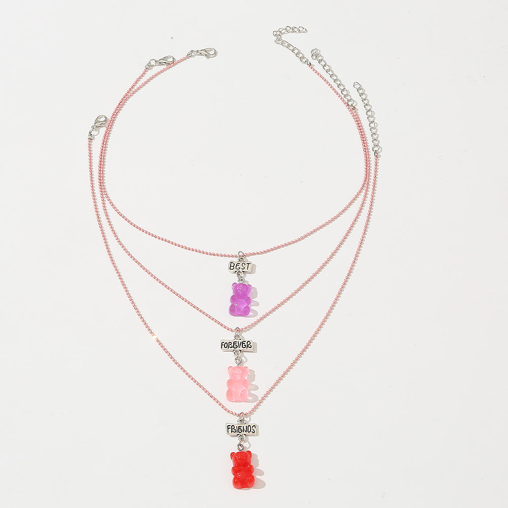 Set di collana in resina a forma di orsetto in stile fumetto per bambini con catena di perline rosa e lunghezza regolabile