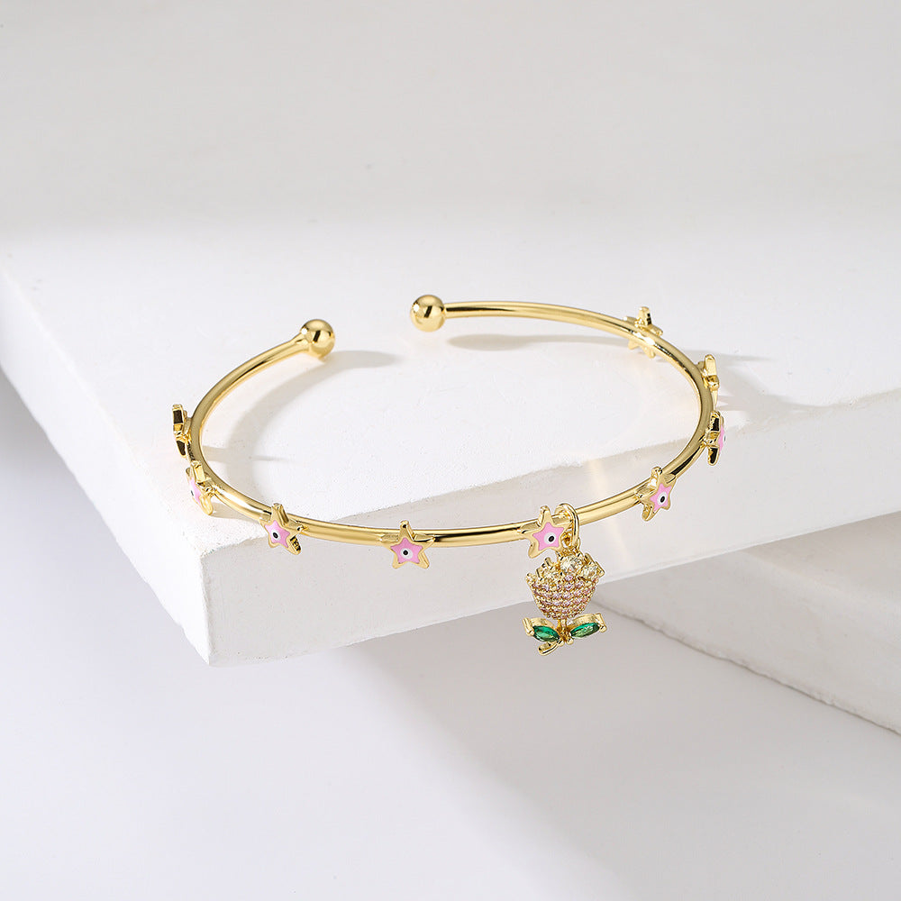Bracciale rigido in rame placcato oro 18 carati smaltato con occhio in stile vintage e ciondolo a fiore di zirconi