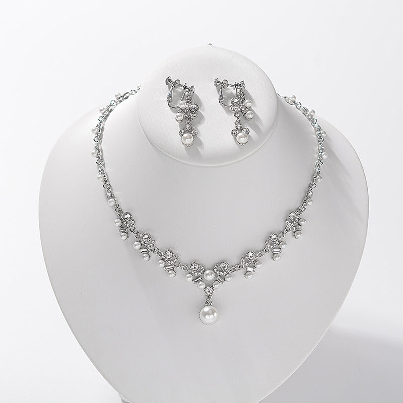 Elegante parure di collana e orecchini in lega con strass e perle intarsiate e catena Singapore, da donna