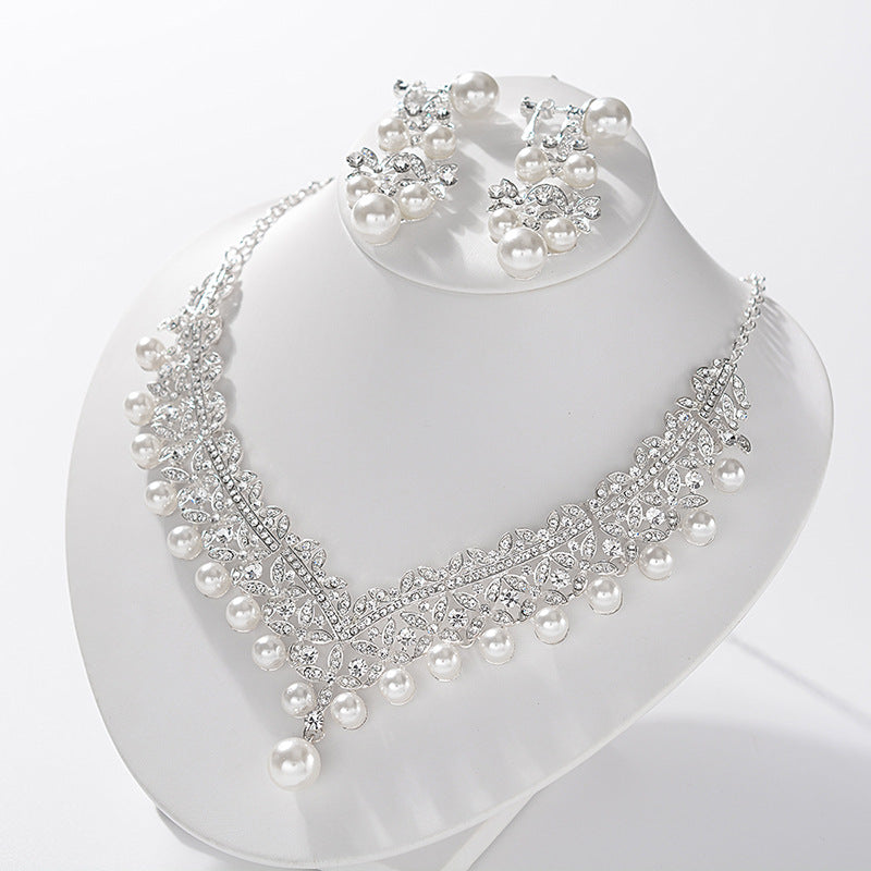 Juego de collar y aretes de aleación con incrustaciones de perlas y pedrería de lujo para mujer