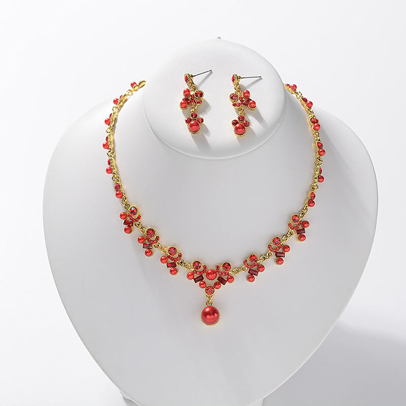 Elegante parure di collana e orecchini in lega con strass e perle intarsiate e catena Singapore, da donna