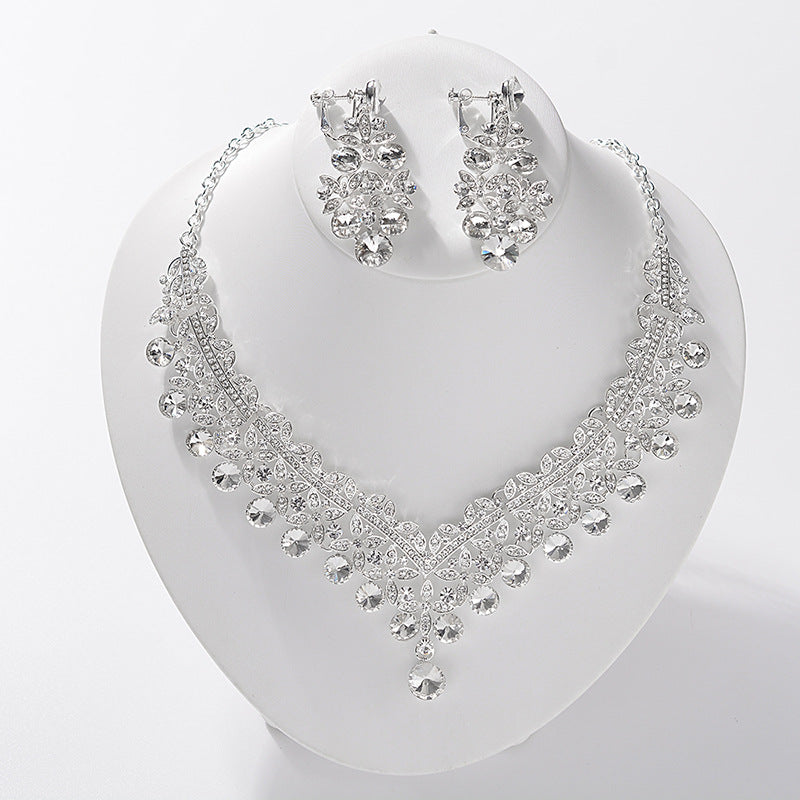 Juego de collar y aretes de aleación con incrustaciones de perlas y pedrería de lujo para mujer