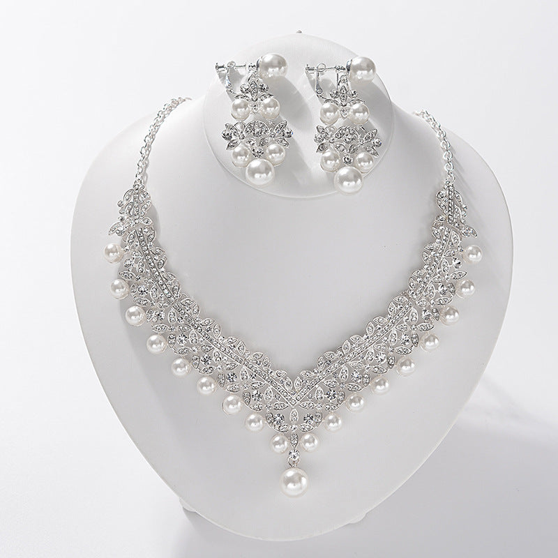 Juego de collar y aretes de aleación con incrustaciones de perlas y pedrería de lujo para mujer