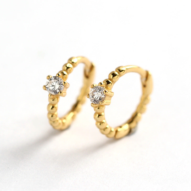 Orecchini a perno tondi con intarsi di diamanti in argento sterling 925