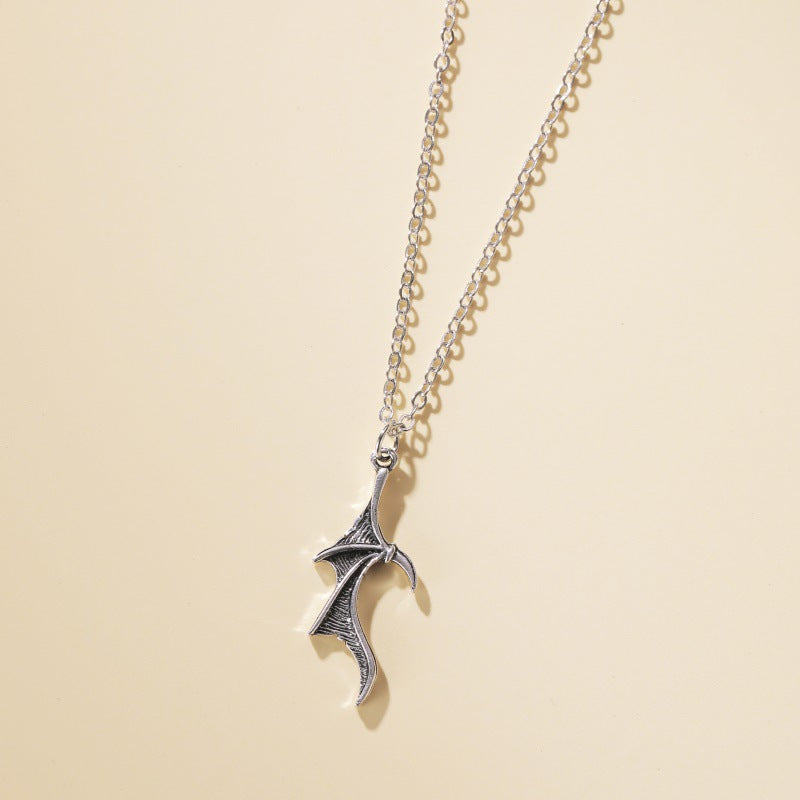 Collar de ala vintage minimalista de aleación con cadena cruzada y colgante de corazón, joyería de moda para mujer