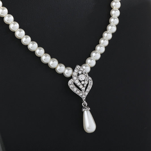Conjunto de collar y pendientes minimalistas casuales con colgante de campana de corazón de perlas de imitación para mujer