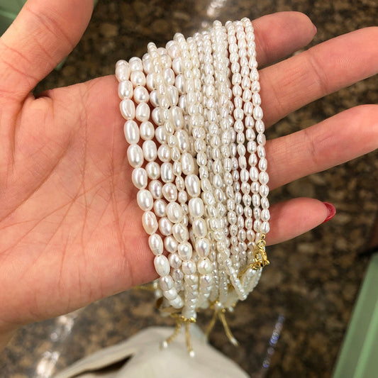 Collana di lusso da donna in argento sterling con perle coltivate e motivo geometrico, stile fresco e dolce, catena a spiga, argento 925