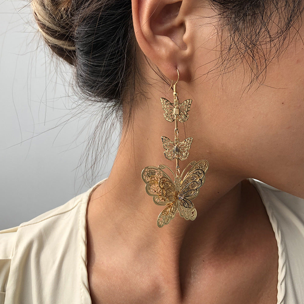 Pendientes de mariposa de aleación chapada, pendientes colgantes largos de moda para mujer, diseño geométrico estilo dulce y moderno
