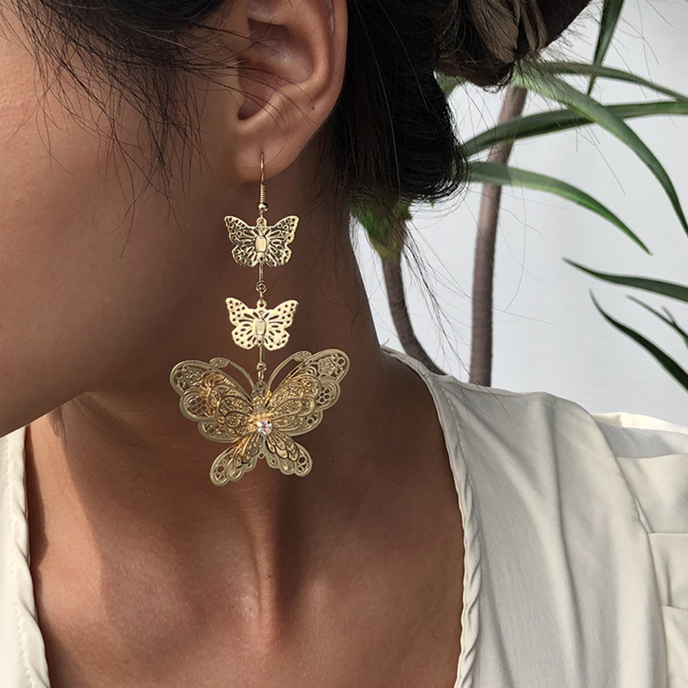 Pendientes de mariposa de aleación chapada, pendientes colgantes largos de moda para mujer, diseño geométrico estilo dulce y moderno