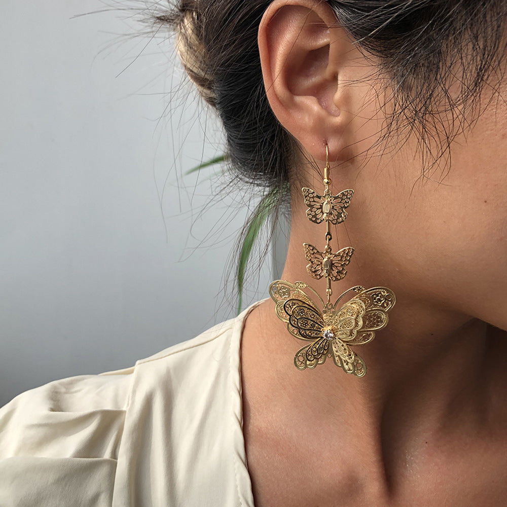 Pendientes de mariposa de aleación chapada, pendientes colgantes largos de moda para mujer, diseño geométrico estilo dulce y moderno