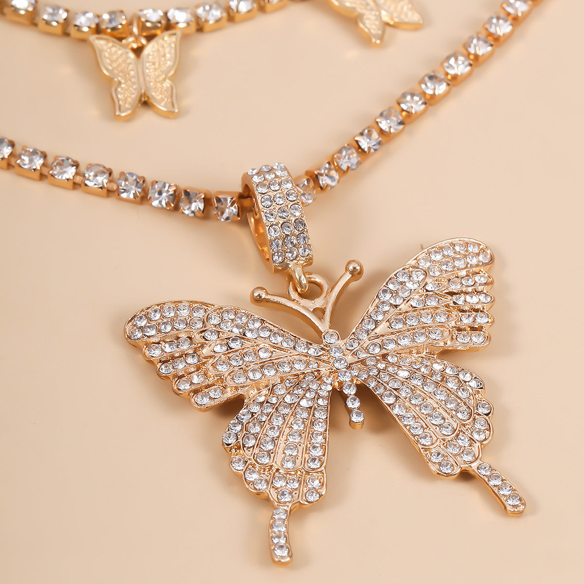 Parure collana geometrica a farfalla con strass e lega per donna, design placcato con catena a griffe, stile individualista, gioielli alla moda