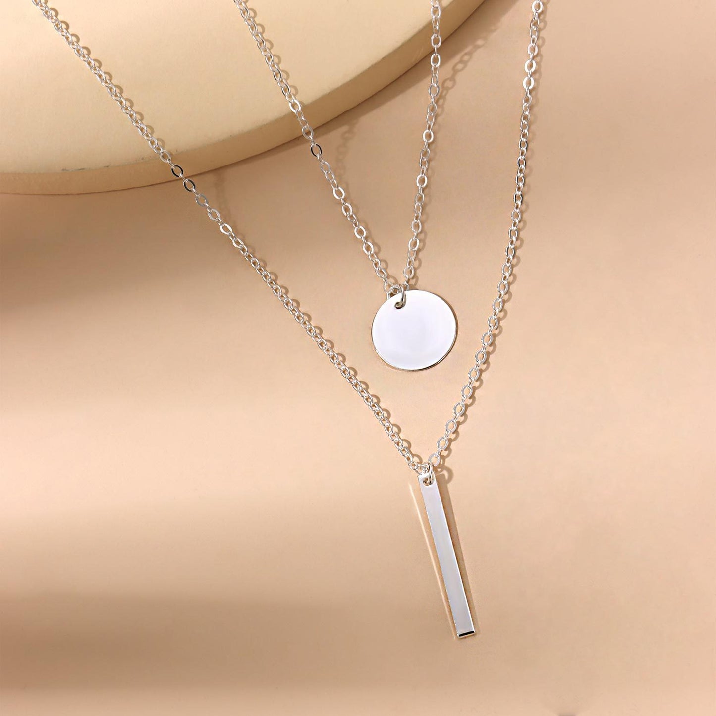 Collana con croce geometrica in lega