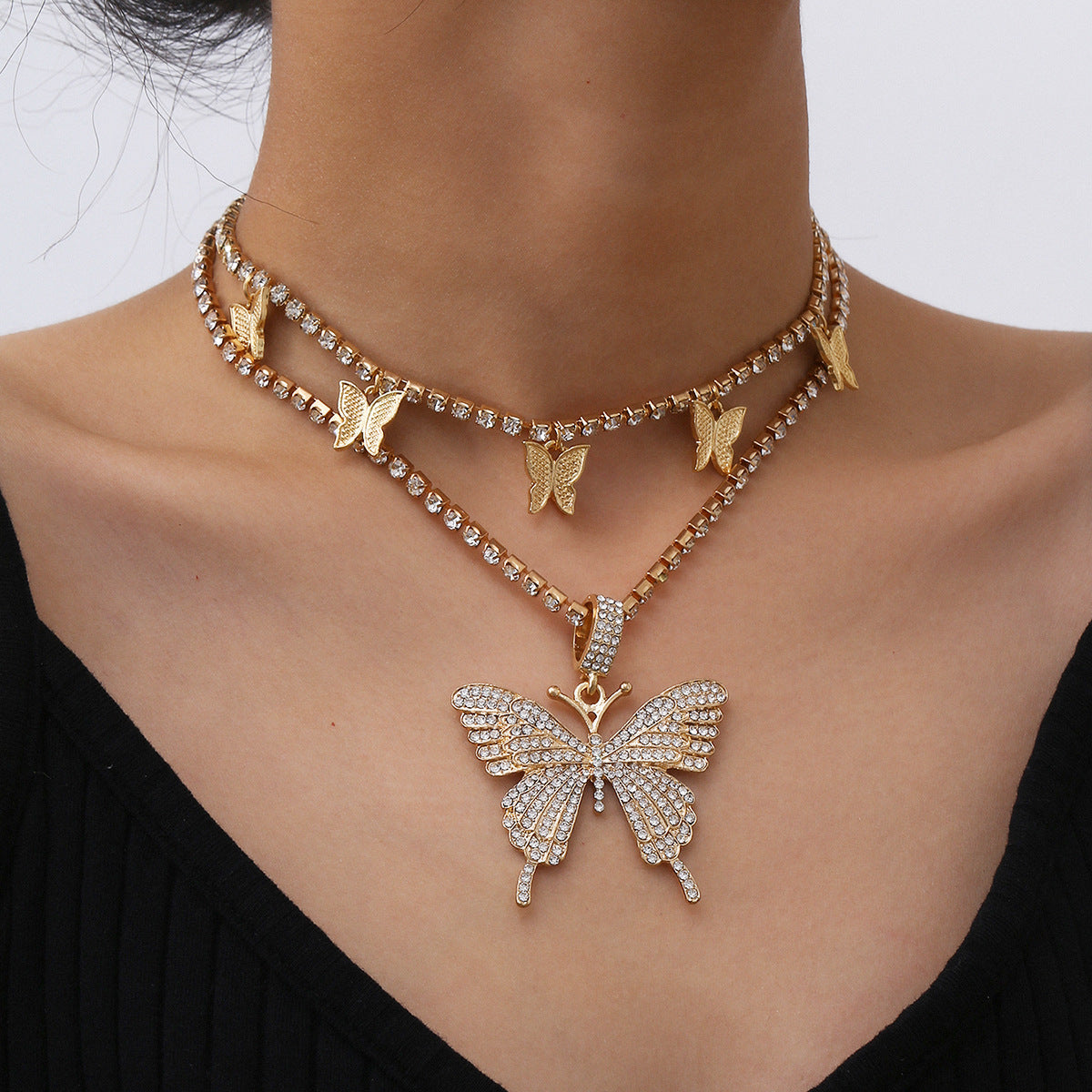 Parure collana geometrica a farfalla con strass e lega per donna, design placcato con catena a griffe, stile individualista, gioielli alla moda
