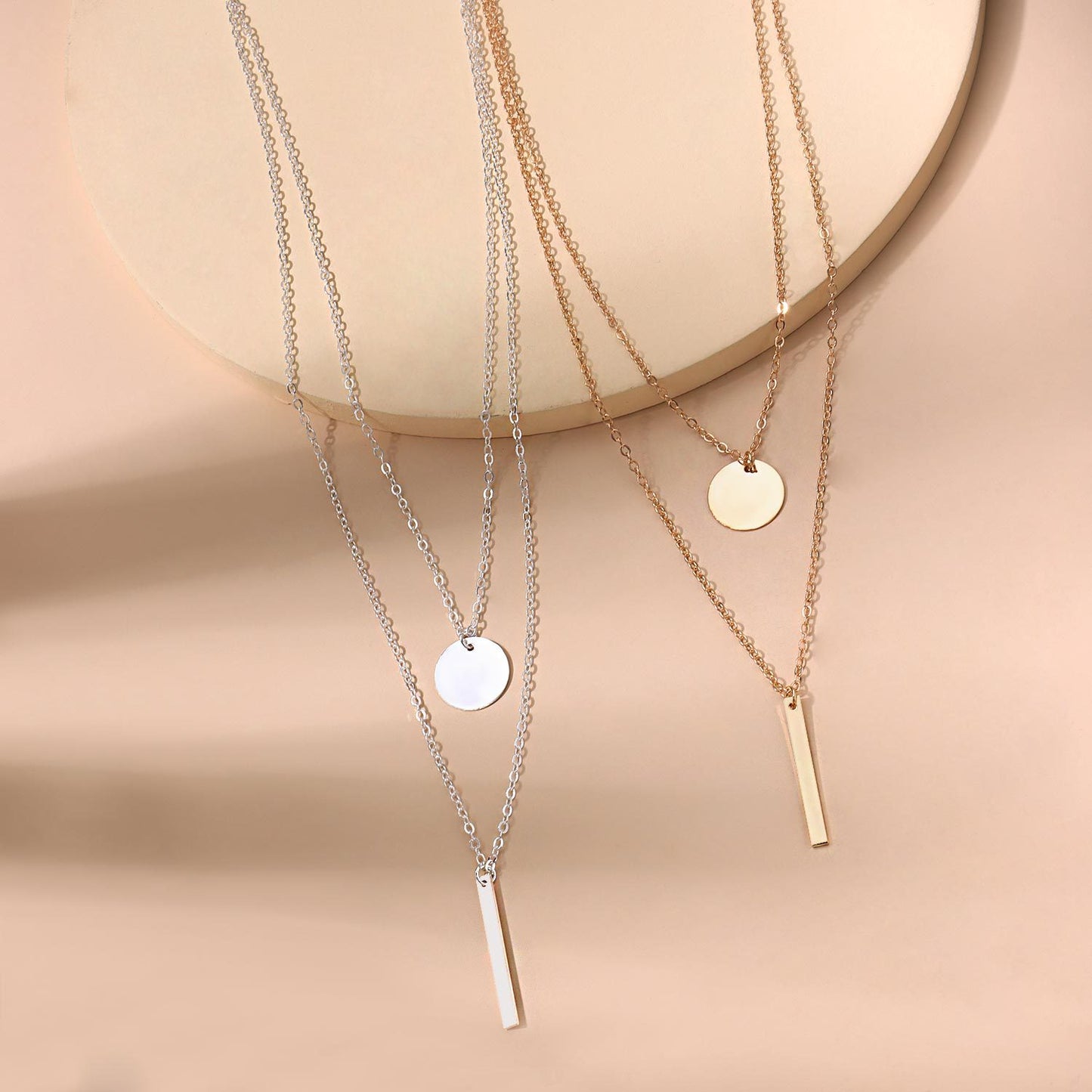 Collana con croce geometrica in lega