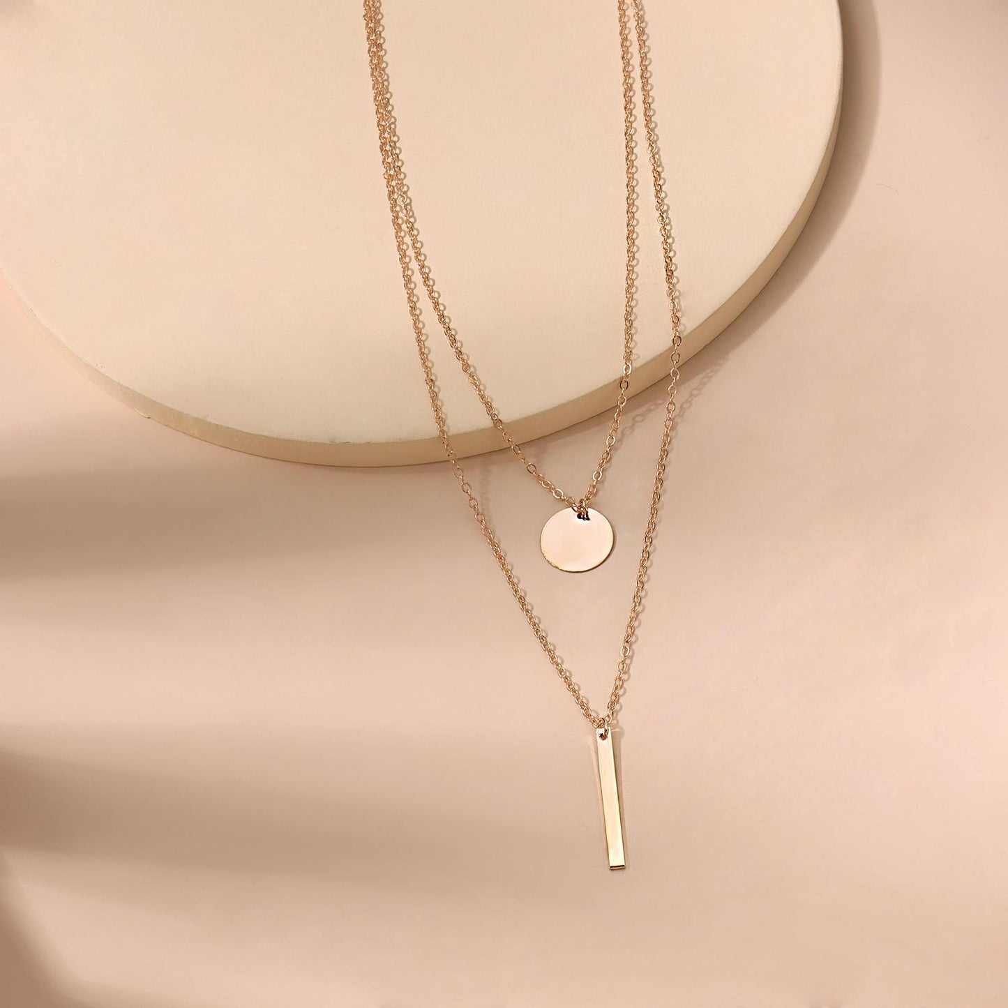 Collana con croce geometrica in lega