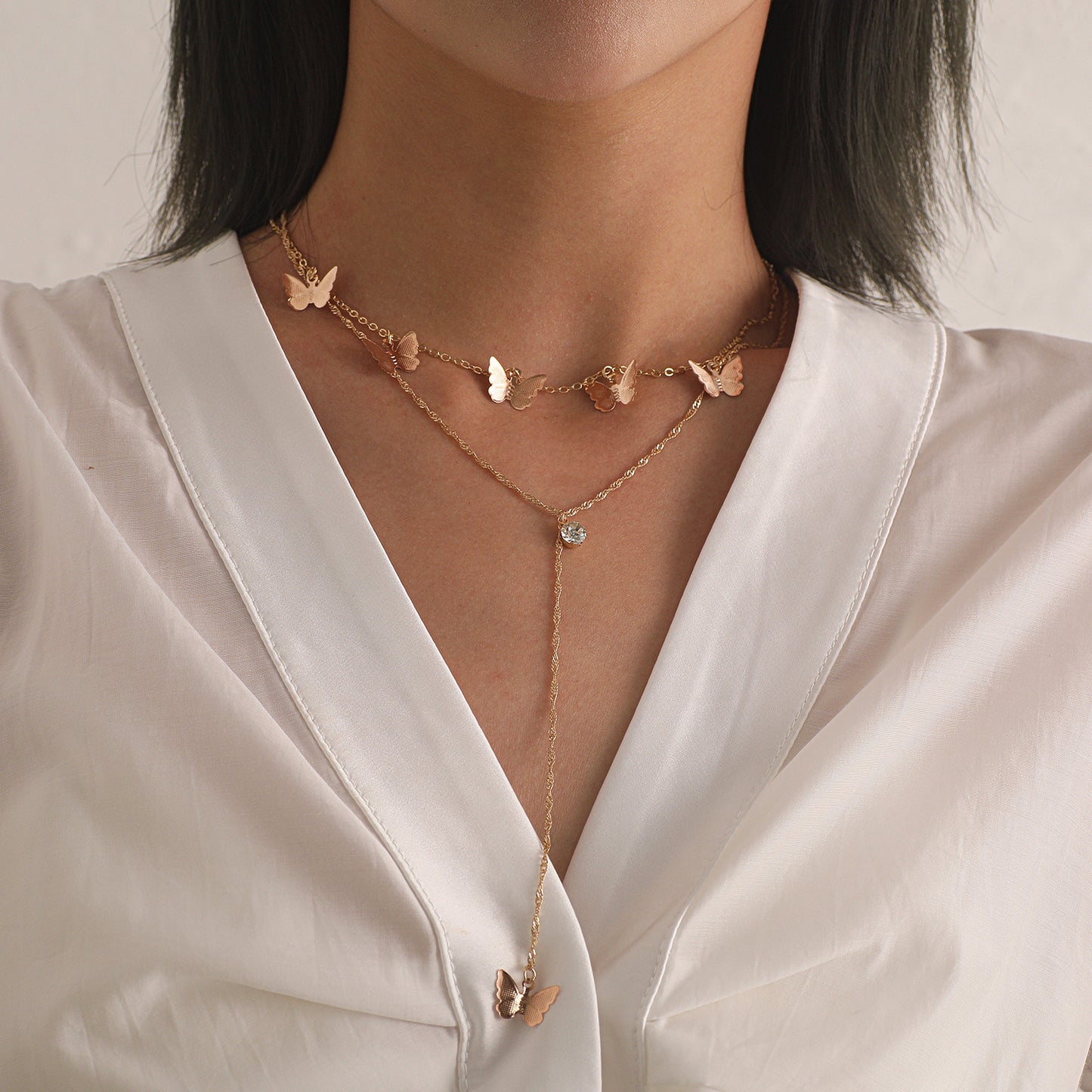 Women's Fashion Double-Layer Alloy Butterfly Pendant Necklace with Rhinestone Drop, Cross Chain Style, Vintage Aesthetic