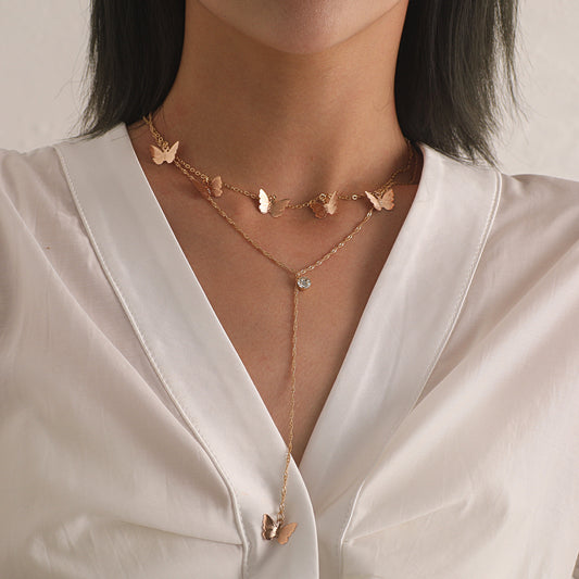 Women's Fashion Double-Layer Alloy Butterfly Pendant Necklace with Rhinestone Drop, Cross Chain Style, Vintage Aesthetic