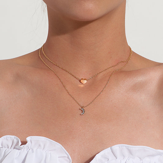 Collar con colgante geométrico de corazón de moda para mujer, cadena cruzada chapada en aleación con incrustaciones de diamantes de imitación, elegante regalo de joyería