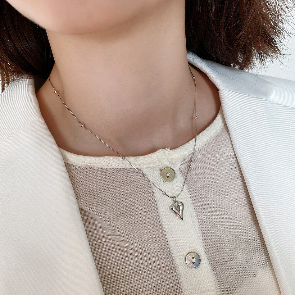 Collana da donna minimalista con ciondolo geometrico a cuore tondo in argento sterling 925