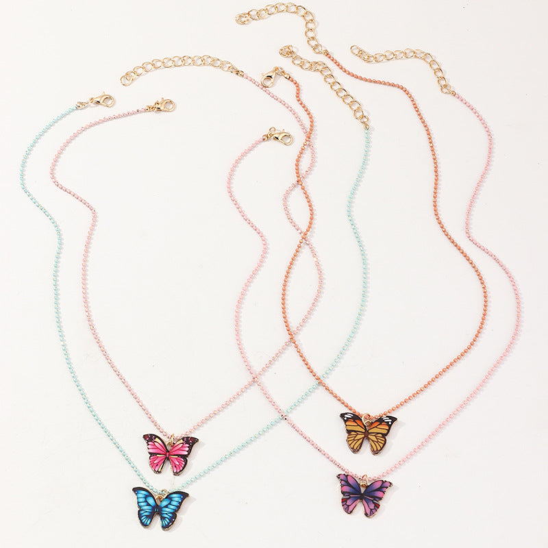 Minimalist Butterfly Pendant Necklace for Children Alloy Chain with Enamel Finish and Acrylic Charm