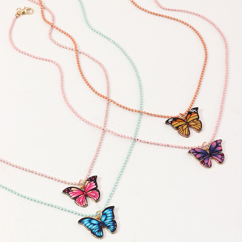 Minimalist Butterfly Pendant Necklace for Children Alloy Chain with Enamel Finish and Acrylic Charm