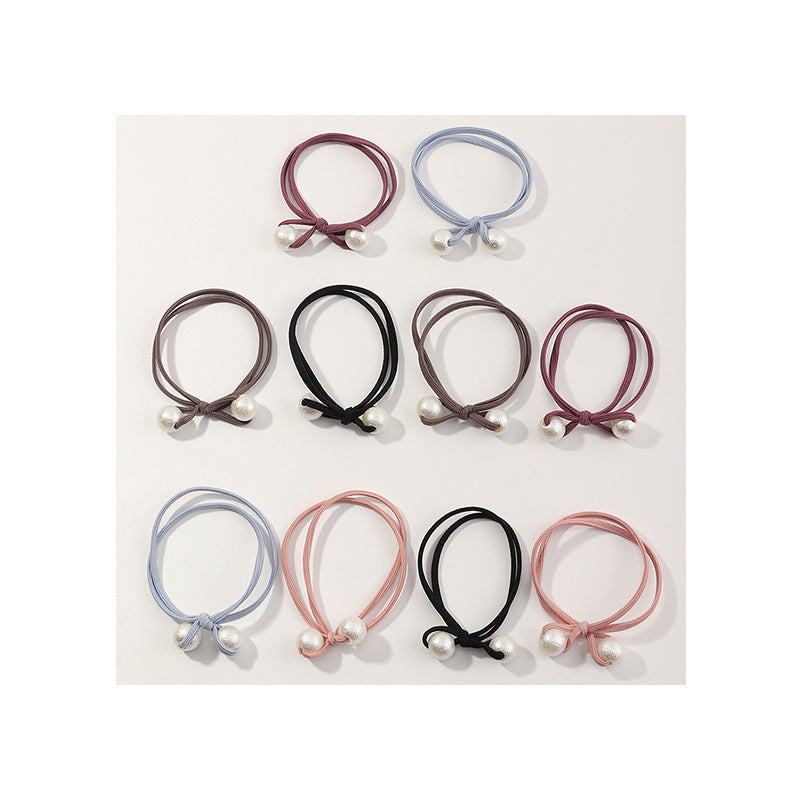 Goma de pelo minimalista con corazón floral para mujer con banda elástica y diseño circular