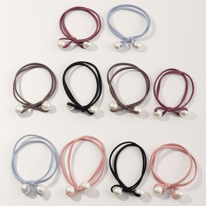 Goma de pelo minimalista con corazón floral para mujer con banda elástica y diseño circular