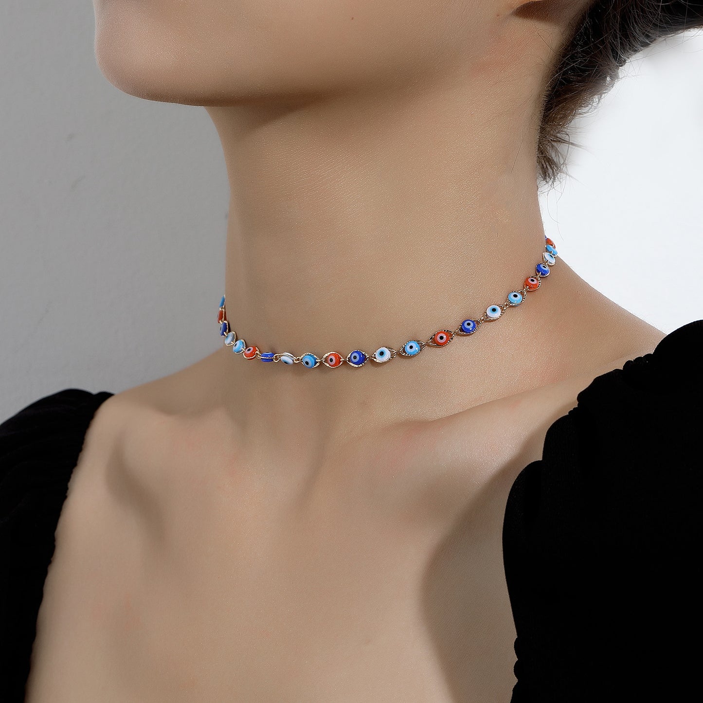 Collar Minimalista de Mal de Ojo para Mujer en Aleación con Acabado Galvanizado y Estilo de Cadena Cruzada