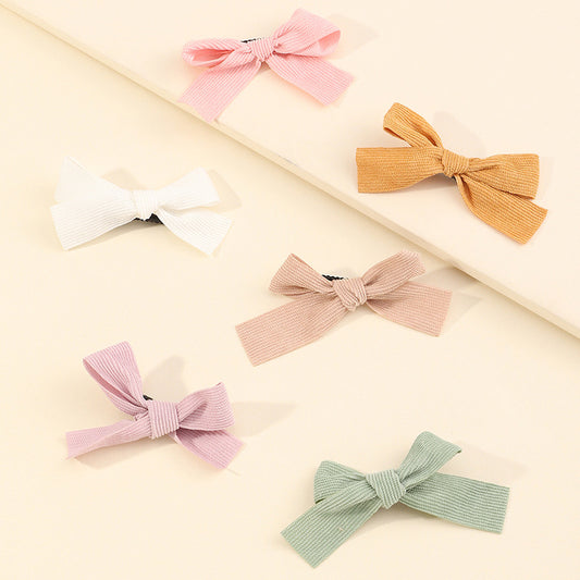 Cute Bowknot Hair Clip for Kids in Natural Forest Fairy Style Minimalist Design with Resin Coating Fabric Material