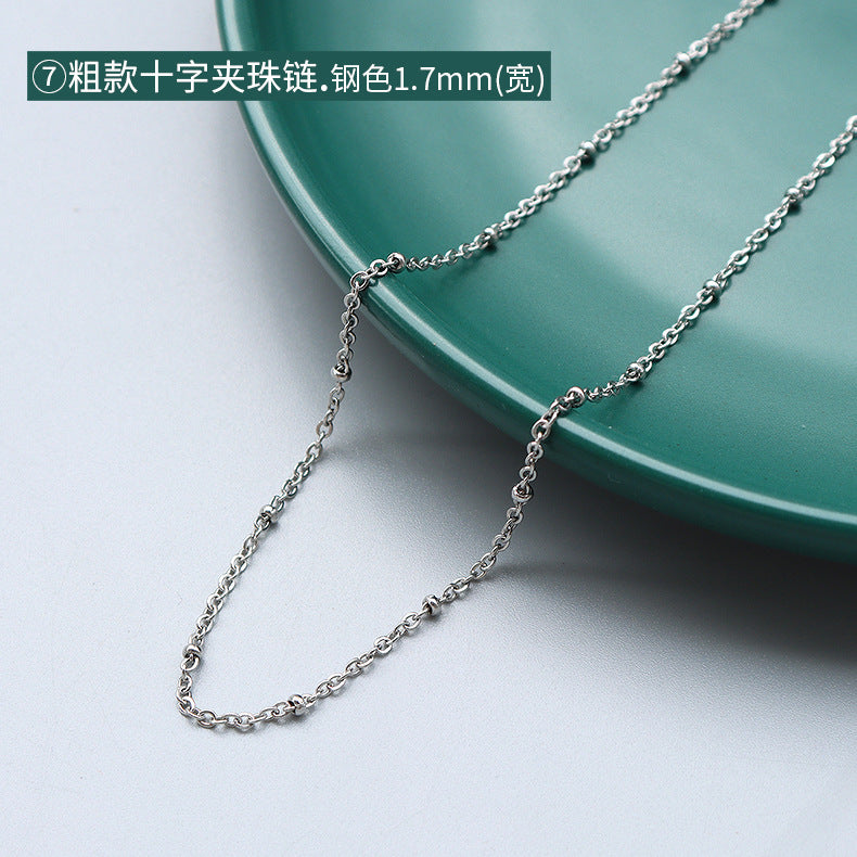 Collana a catena serpentina in acciaio al titanio placcato oro 18 carati, stile lusso leggero, con design a linea geometrica ondulata da donna