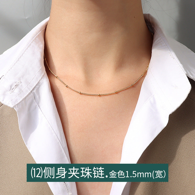 Collana a catena serpentina in acciaio al titanio placcato oro 18 carati, stile lusso leggero, con design a linea geometrica ondulata da donna