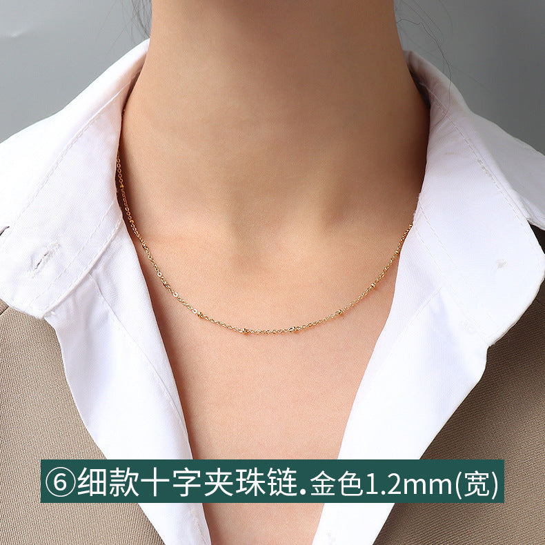 Collana a catena serpentina in acciaio al titanio placcato oro 18 carati, stile lusso leggero, con design a linea geometrica ondulata da donna