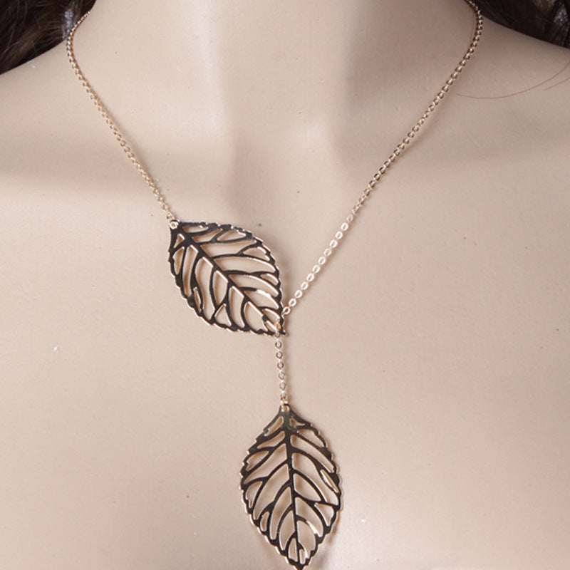 Minimalist Nature Inspired Metal Leaf Pendant Necklace for Women Short Clavicle Chain with Cross Link Design
