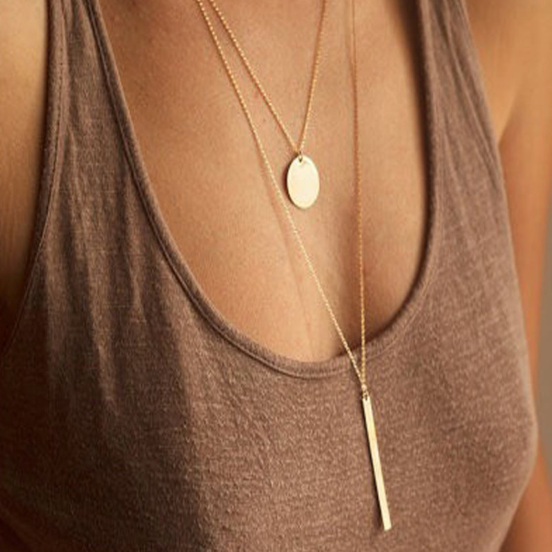 Collana con croce geometrica in lega