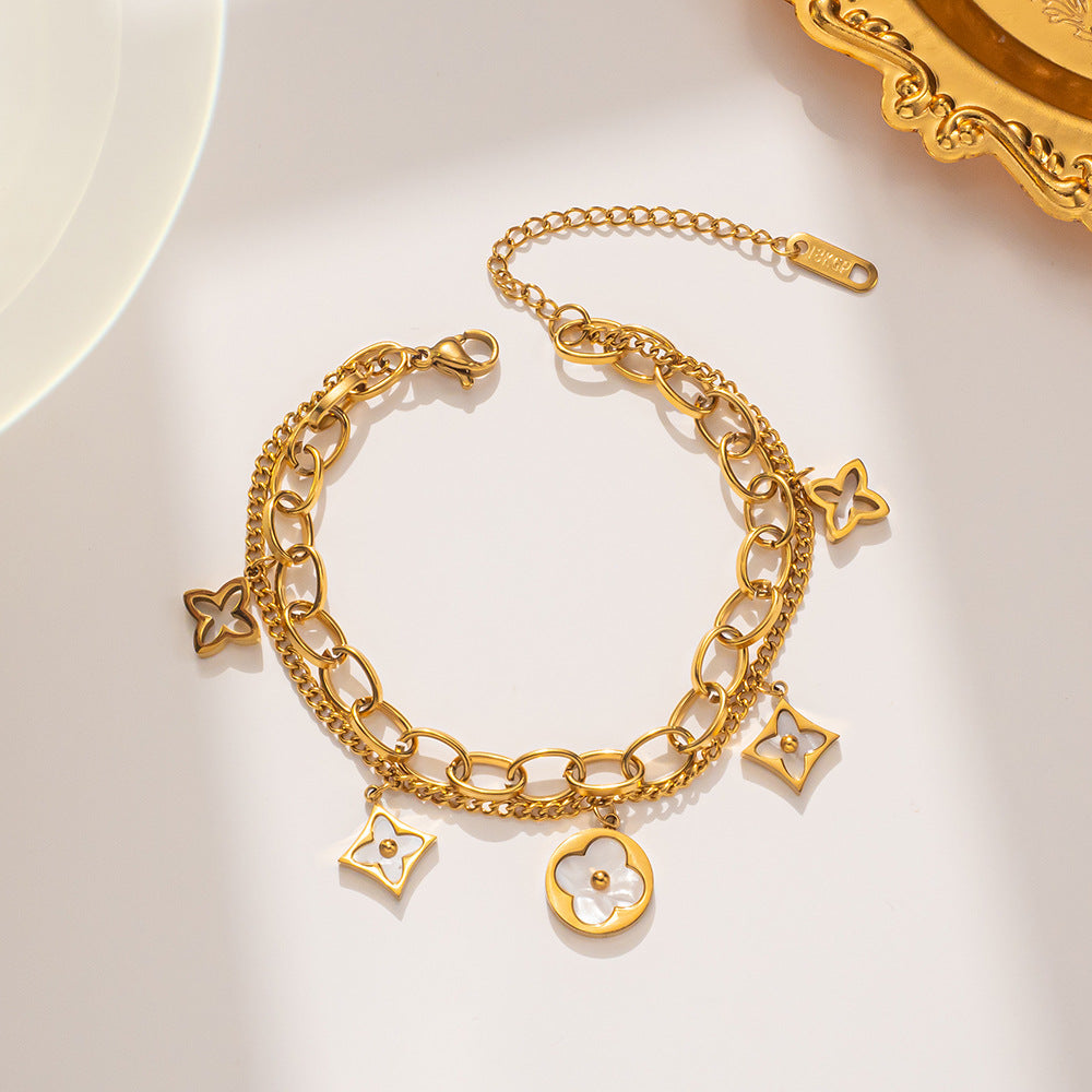 Bracciale minimalista in acciaio al titanio a forma di trifoglio con finitura placcata da donna