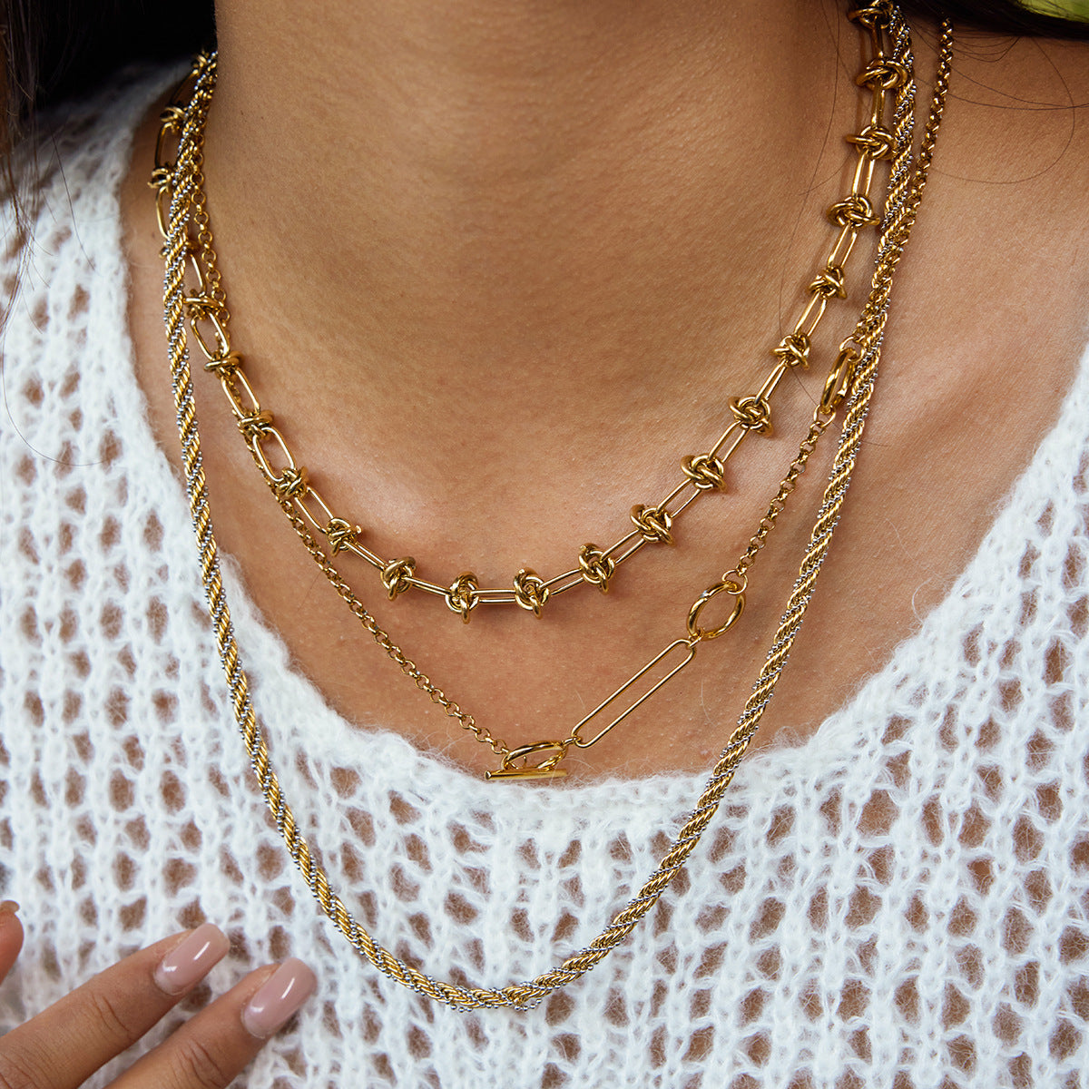 Set di collana e bracciale da donna in corda intrecciata d'acciaio inossidabile moderno e minimalista con finitura placcata