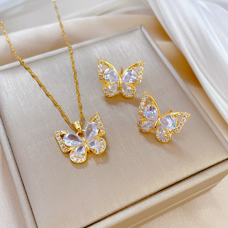 Set di collana e orecchini geometrici a farfalla in titanio di lusso